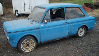 Illustration for article titled Trio of Hillman Imps define project car hell